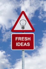 Signpost for 'Fresh Ideas' against a blue cloudy sky