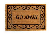doormat reading "Go Away"