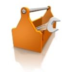 orange toolbox with wrench