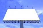 blank billboard against blue skies