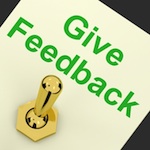 green "Give Feedback" text above gold switch