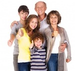 surprised and happy family posing together with thumbs up