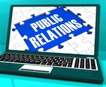 laptop with text reading "public relations"