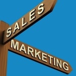 signs reading "Sales" and "Marketing"