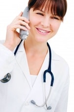 Female doctor talking on phone and smiling