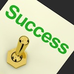 Green "Success" text above golden switch