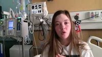 Video clip thumbnail of Morgan in hospital bed