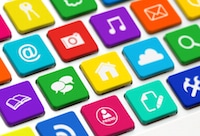 colorful social media symbols as keyboard keys