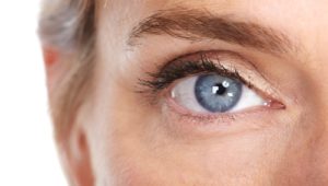 Closeup of older woman's blue eye