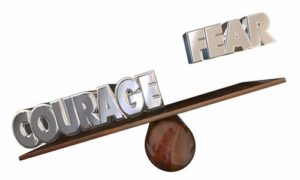 courage over fear seesaw