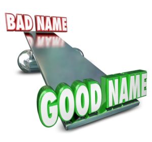 balance scale with "good name" on one side and "bad name" on other