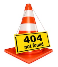 404 code on sign hanging over orange cone
