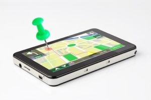 GPS map on screen with a thumbtack on destination