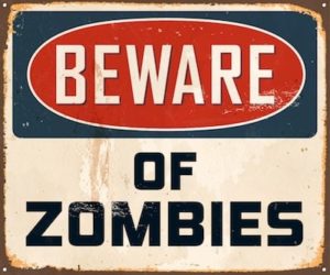 sign reading "BEWARE OF ZOMBIES"