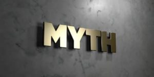 marble wall with gold letters reading "MYTH"