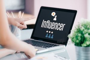 laptop with text reading "Influencer"
