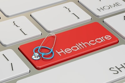 Red "Healthcare" keyboard key with tiny stethoscope attached to it