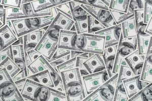 100 dollar bills representing cost of digital advertising