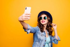 woman taking selfie for snapchat