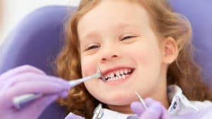 young girl at the dentist's