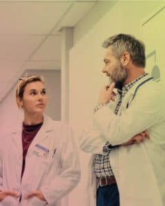 Photo of two physicians talking