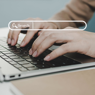 Person typing on laptop