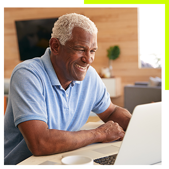 Seniorman using laptop
